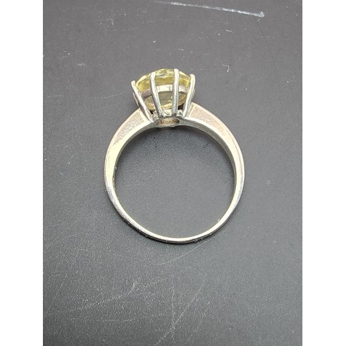 202 - A good quality 925 silver statement ring inset with a large natural citrine domed faceted gemstone, ... 