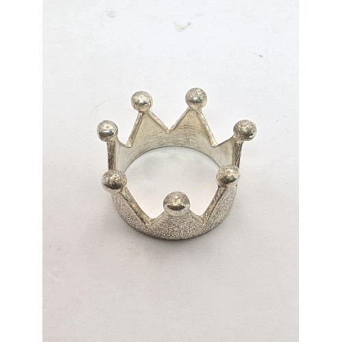 204 - An unusual as new 925 silver crown formed ring, never had any use and is well crafted, size N and co... 