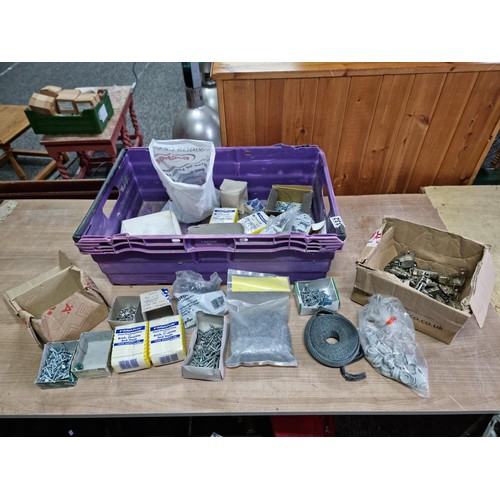 332 - Large crate containing a quantity of shed odds inc boxed screws, nails, raw plugs, cupboard door hin... 