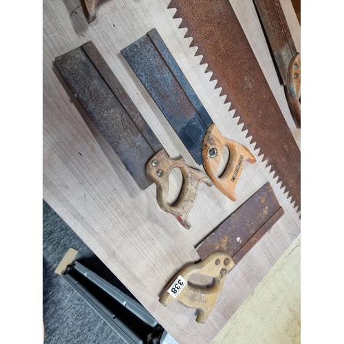 338 - Collection of carpenters and wood saws including a good quality two man wood saw, Spear and Jackson ... 