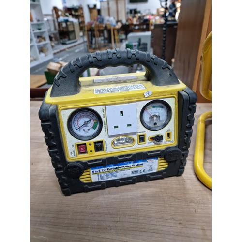 344 - 6-in-1 12V portable power station with a 230v output, usb connector, jump leads, torch. Missing powe... 