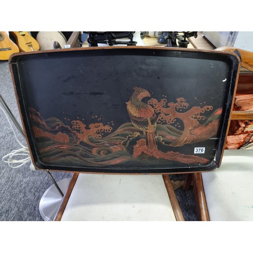 370 - Very large Asian black lacquered tray showing some age, with a decoration of an Eagle and tree desig... 