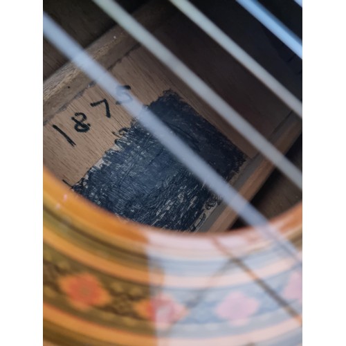 368 - A Full size, nylon strung classical guitar, in playable condition with hard case. Hard case is missi... 