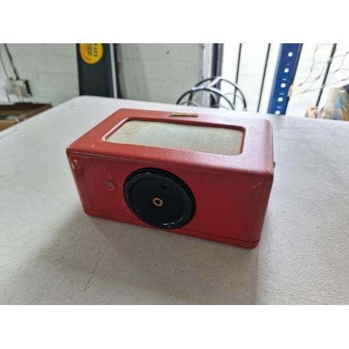 371 - A small portable Roberts transistor radio model R-200, battery operated with built in aerial, along ... 