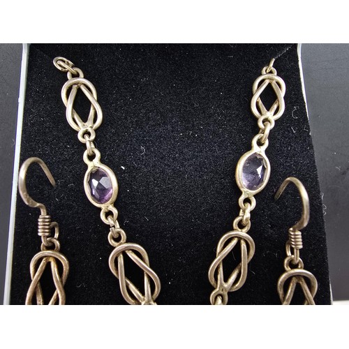 219 - A pretty hand made 925 silver and amethyst matching jewellery set featuring a pretty necklace inset ... 