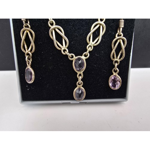 219 - A pretty hand made 925 silver and amethyst matching jewellery set featuring a pretty necklace inset ... 