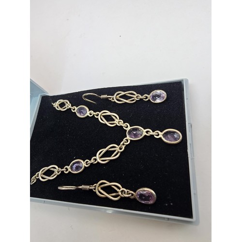 219 - A pretty hand made 925 silver and amethyst matching jewellery set featuring a pretty necklace inset ... 