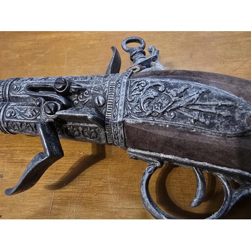 278 - 2x replica 18th century flintlock pistols each having a different design, made out of solid wood wit... 