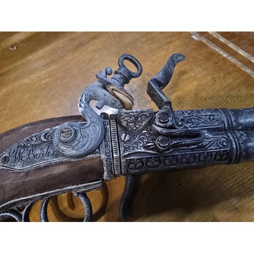 278 - 2x replica 18th century flintlock pistols each having a different design, made out of solid wood wit... 