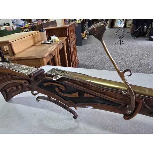 282 - A large and impressive replica 18th century matchlock musket which is beautifully made featuring a d... 