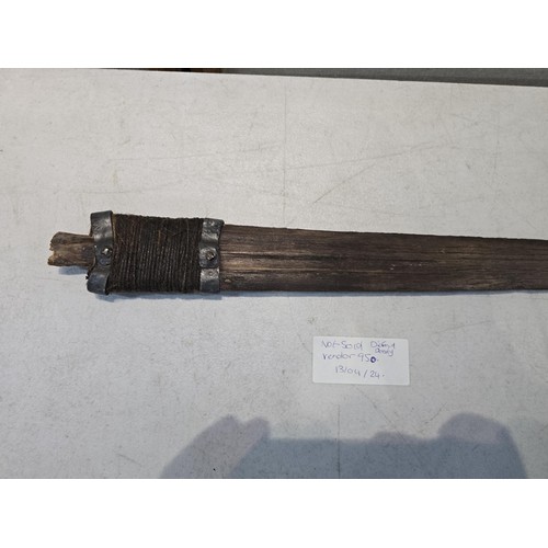 292 - An impressive antique swordfish bill blade with an antique hammered metal collar and string made han... 