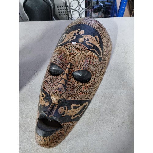 352C - Good quality wall hanging wooden African mask very well decorated made out of a solid piece of wood ... 