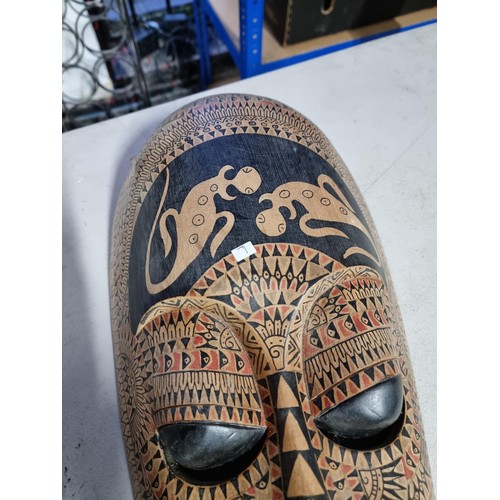 352C - Good quality wall hanging wooden African mask very well decorated made out of a solid piece of wood ... 