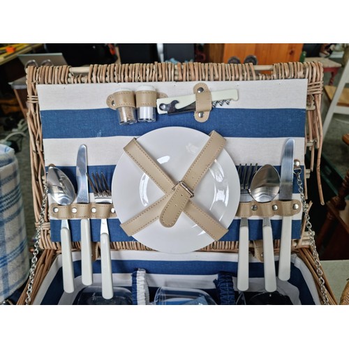 379 - Good quality 2 person picnic wicker hamper along with a 2 person picnic rucksack with blue tartan ru... 