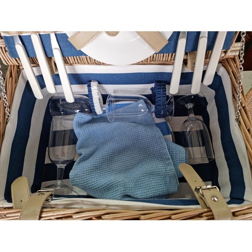 379 - Good quality 2 person picnic wicker hamper along with a 2 person picnic rucksack with blue tartan ru... 