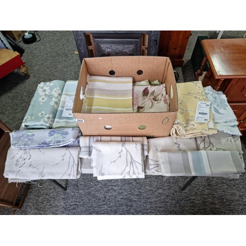 388 - Box containing a large quantity of Laura Ashley Home fabrics, of various designs inc willow, floral ... 