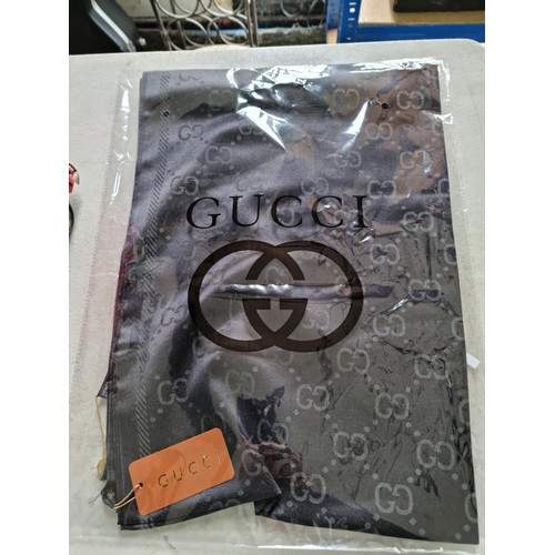 364 - Quantity of collectables to include a new and sealed Gucci style scarf, an as new boxed Ultimate Spe... 