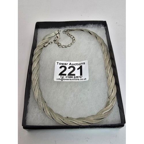 221 - A quantity of boxed costume jewellery items to include an attractive triple strand silver plated nec... 