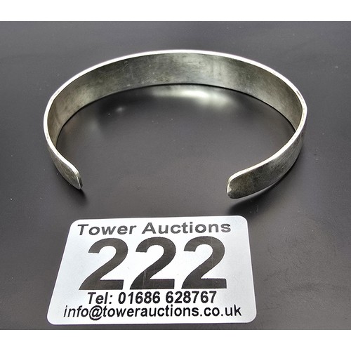 222 - A chunky 925 silver torque bangle having an Aztec South American design, is in good clean condition ... 