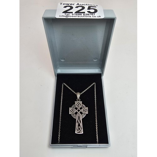 225 - An attractive 925 silver Celtic cross formed pendant with a pierced design stet on a 16