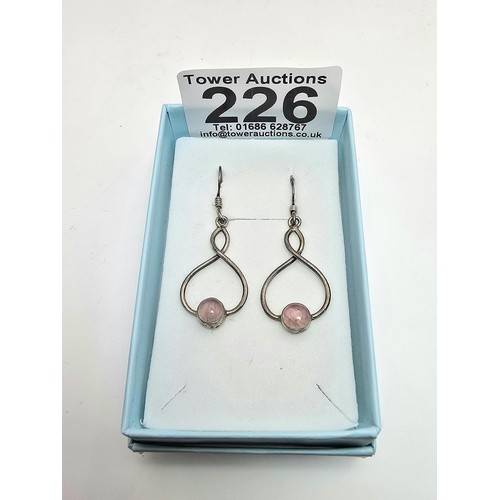 226 - A pair of pretty 925 silver drop earrings inset with rose quartz cabochon stones, length of the drop... 