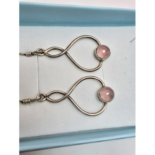 226 - A pair of pretty 925 silver drop earrings inset with rose quartz cabochon stones, length of the drop... 