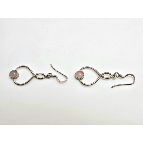 226 - A pair of pretty 925 silver drop earrings inset with rose quartz cabochon stones, length of the drop... 