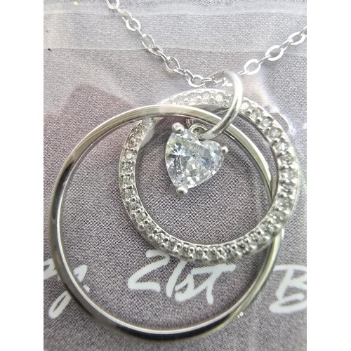 228 - A brand new Happy 21st Birthday 925 silver necklace featuring 2 rings 