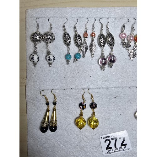 272 - A large bundle of approx 26 pairs of costume earrings all with interesting designs, some have art gl... 