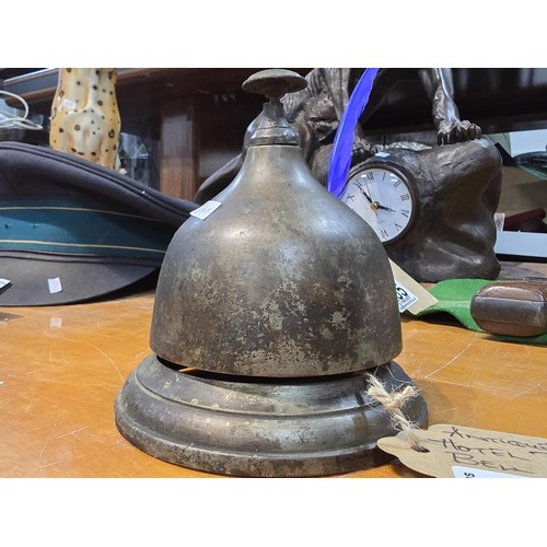 284 - A lovely quality antique reception desk bell in bee hive form, made completely out of metal and is i... 