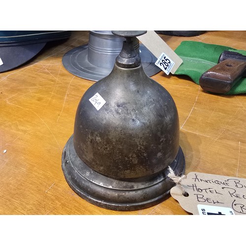 284 - A lovely quality antique reception desk bell in bee hive form, made completely out of metal and is i... 