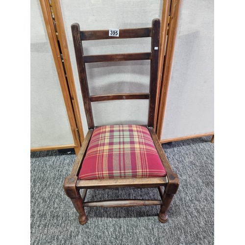 395 - Good quality antique oak child's chair with padded tartan seat in good order chair measures 77cm hig... 