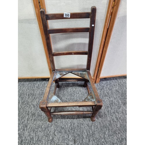 395 - Good quality antique oak child's chair with padded tartan seat in good order chair measures 77cm hig... 