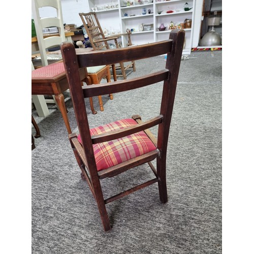 395 - Good quality antique oak child's chair with padded tartan seat in good order chair measures 77cm hig... 