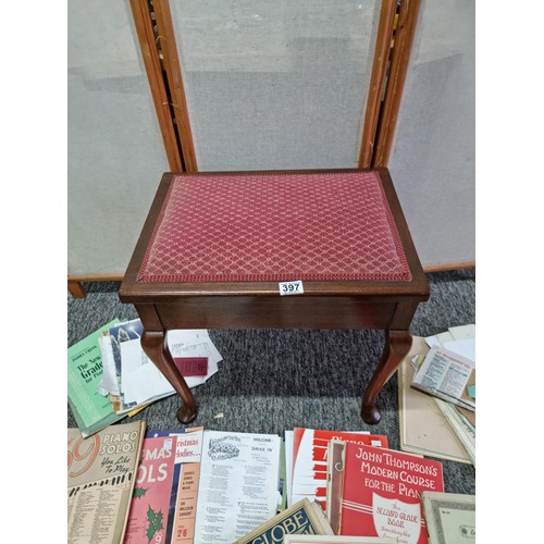 397 - Good quality mahogany red cushion topped piano stool with lift up lid, lid lifts to reveal a large q... 