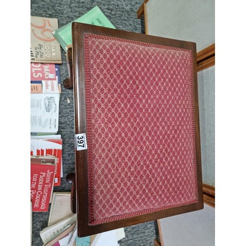 397 - Good quality mahogany red cushion topped piano stool with lift up lid, lid lifts to reveal a large q... 