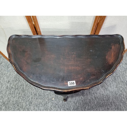 398 - Vintage demi lune hall table varnished in dark brown with shelf underneath in good overall condition... 