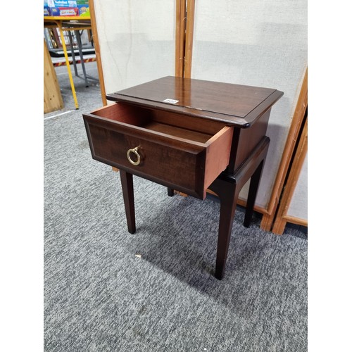 402 - Good quality Stag lamp table with single drawer to the top in good order with metal handle, stands a... 