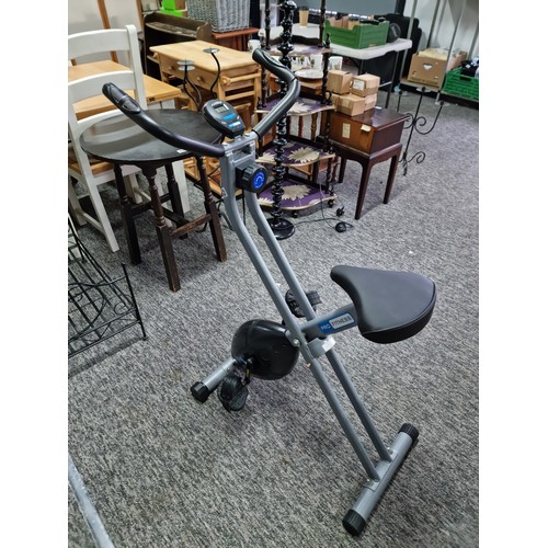 392 - Pro fitness exercise bike with digital display and touch keys to the handle bars in working order