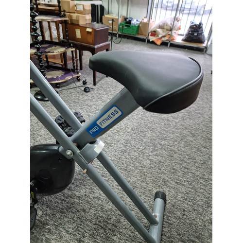 392 - Pro fitness exercise bike with digital display and touch keys to the handle bars in working order