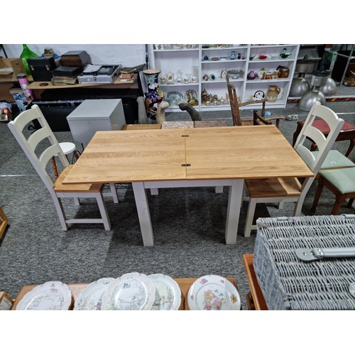 407 - Good quality modern cream and beech solid wood foldout dining table and two good quality solid chair... 