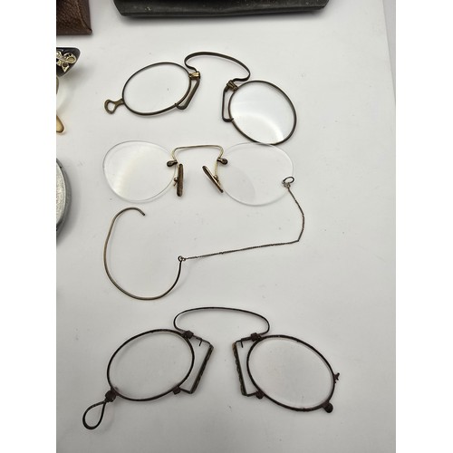 235 - A collection of various vintage and antique spectacles and pince nez which includes a 10ct gold fill... 