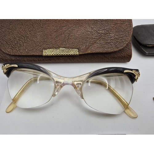 235 - A collection of various vintage and antique spectacles and pince nez which includes a 10ct gold fill... 