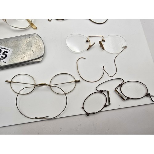 235 - A collection of various vintage and antique spectacles and pince nez which includes a 10ct gold fill... 