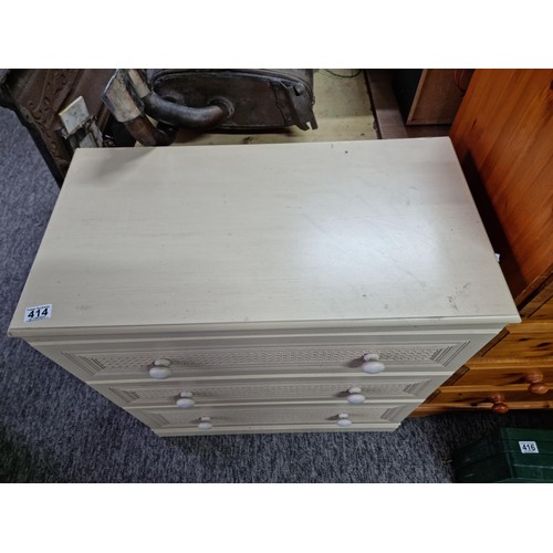 414 - Good quality cream coloured three drawer chest of drawers by Alstons Furniture, with lattice design ... 