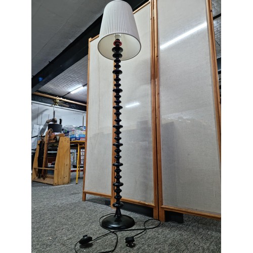 417 - Large black bobbin twist design modern floor standard lamp with cream shade, stands at 166cm high