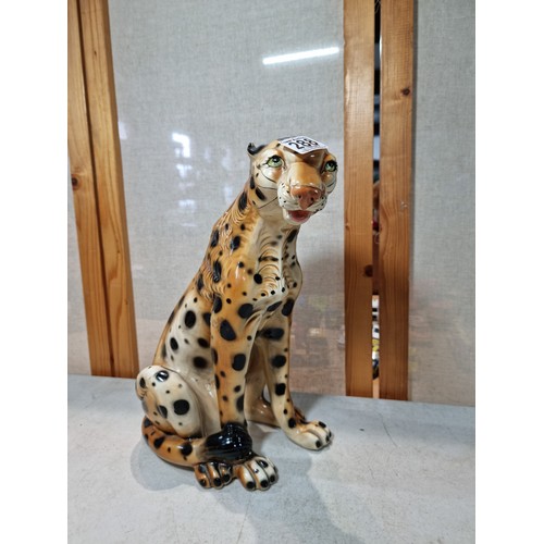 288 - A pair of tall impressive ceramic cheetah figures, both in a seated position and can be arrange to b... 