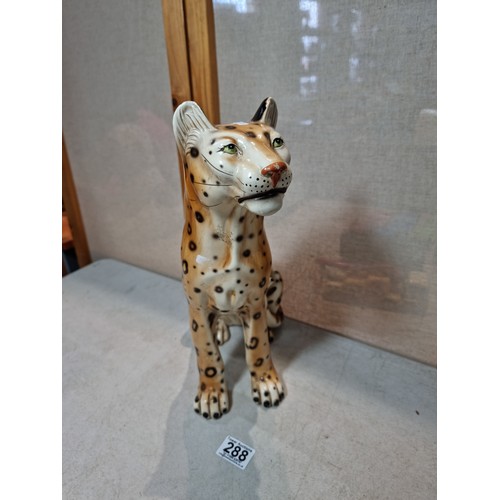 288 - A pair of tall impressive ceramic cheetah figures, both in a seated position and can be arrange to b... 