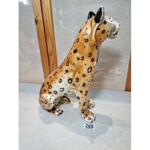 288 - A pair of tall impressive ceramic cheetah figures, both in a seated position and can be arrange to b... 