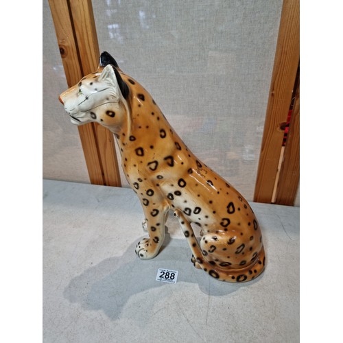 288 - A pair of tall impressive ceramic cheetah figures, both in a seated position and can be arrange to b... 